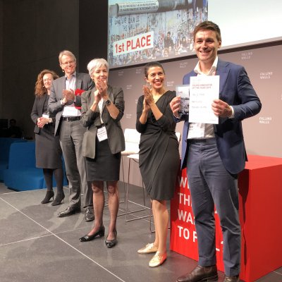 Rhys Pirie receives his award in Berlin